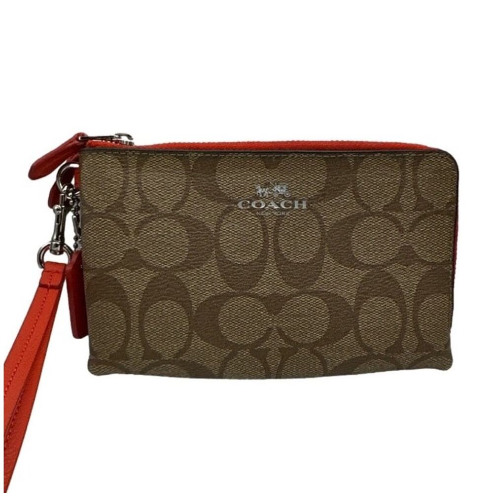COACH Brown Signature Coated Canvas Wristlet